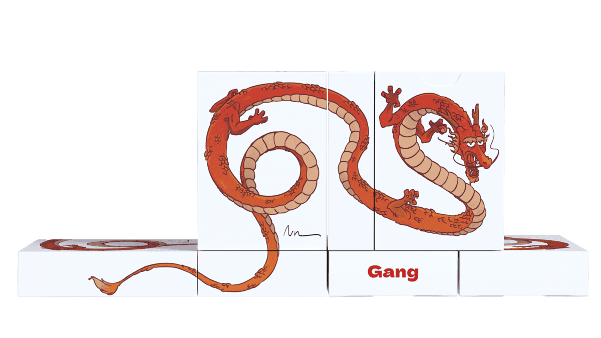 7 boxes of my card game featuring a Chinese dragon whose long body stretches across several sides of the box.